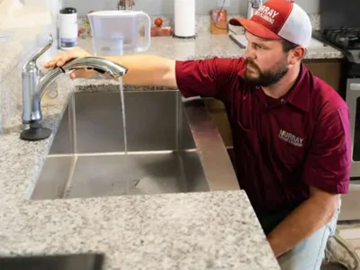 Murray Plumber Testing Faucet