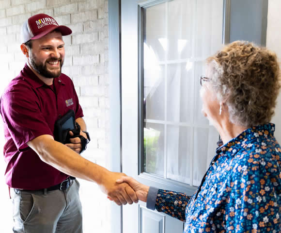 Murray tech greeting customer